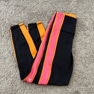 IVL Collective black, orange and pink leggings.